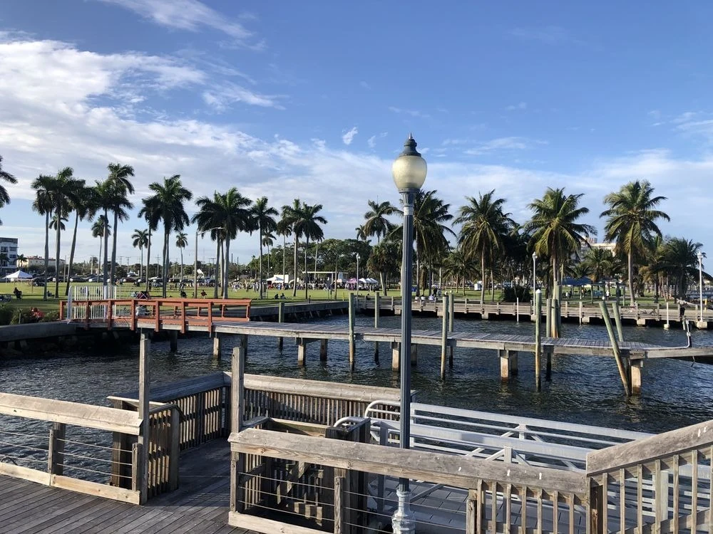 Currie Park waterfront dock and palm trees West Palm Beach